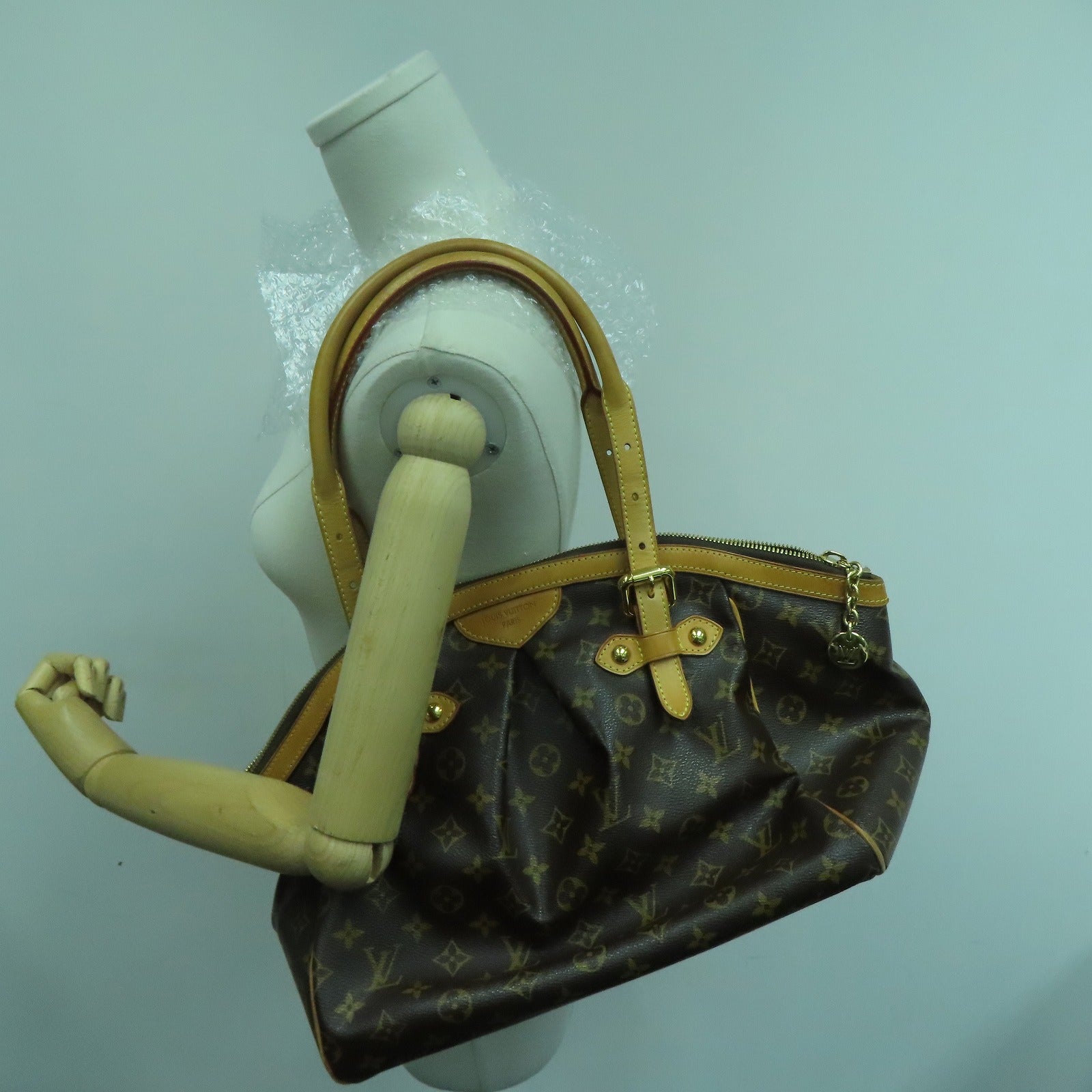 LOUIS VUITTON Monogram Tivoli GM Gold Buckle Handle Bag Brown – Brand Off  Hong Kong Online Store