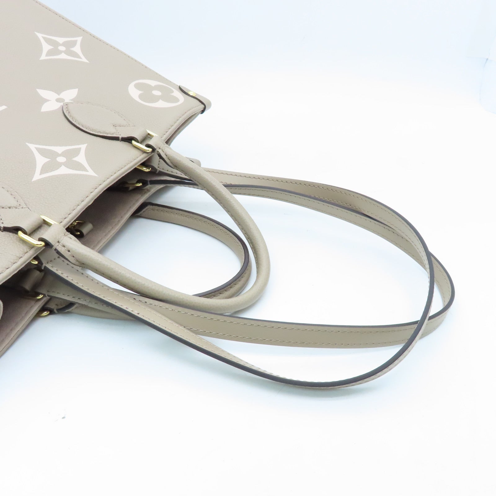 Louis Vuitton Onthego mm Dove/Cream Monogram Empreinte